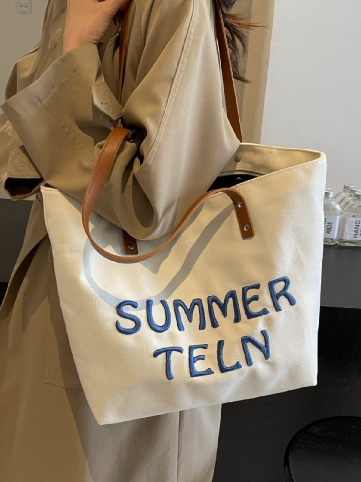 Casualruby © Embroidered letter canvas tote bag