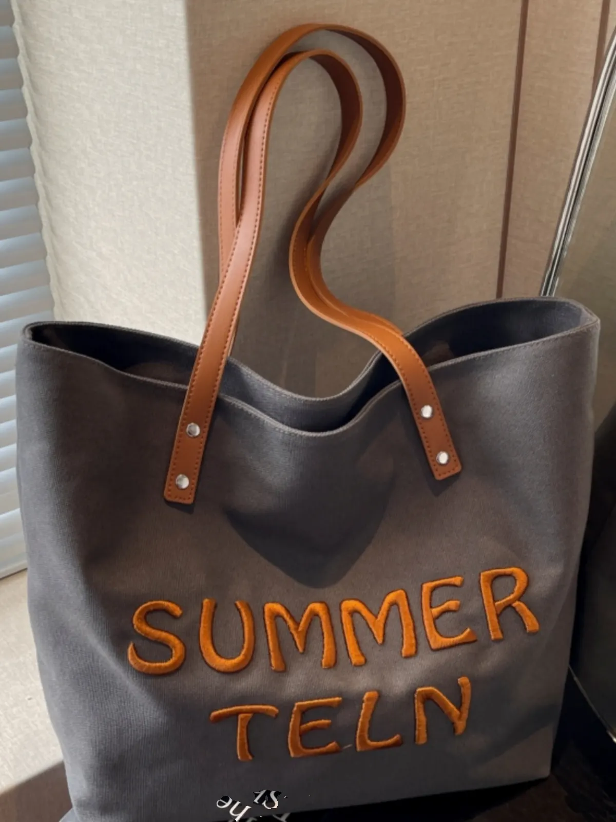 Casualruby © Embroidered letter canvas tote bag